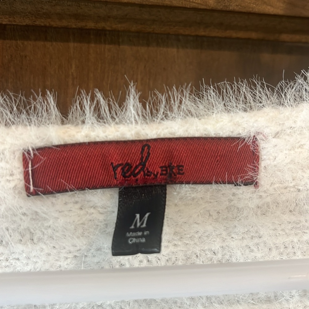 White/light cream crossbody sweater….gently used.  Size medium - Picture 2 of 4